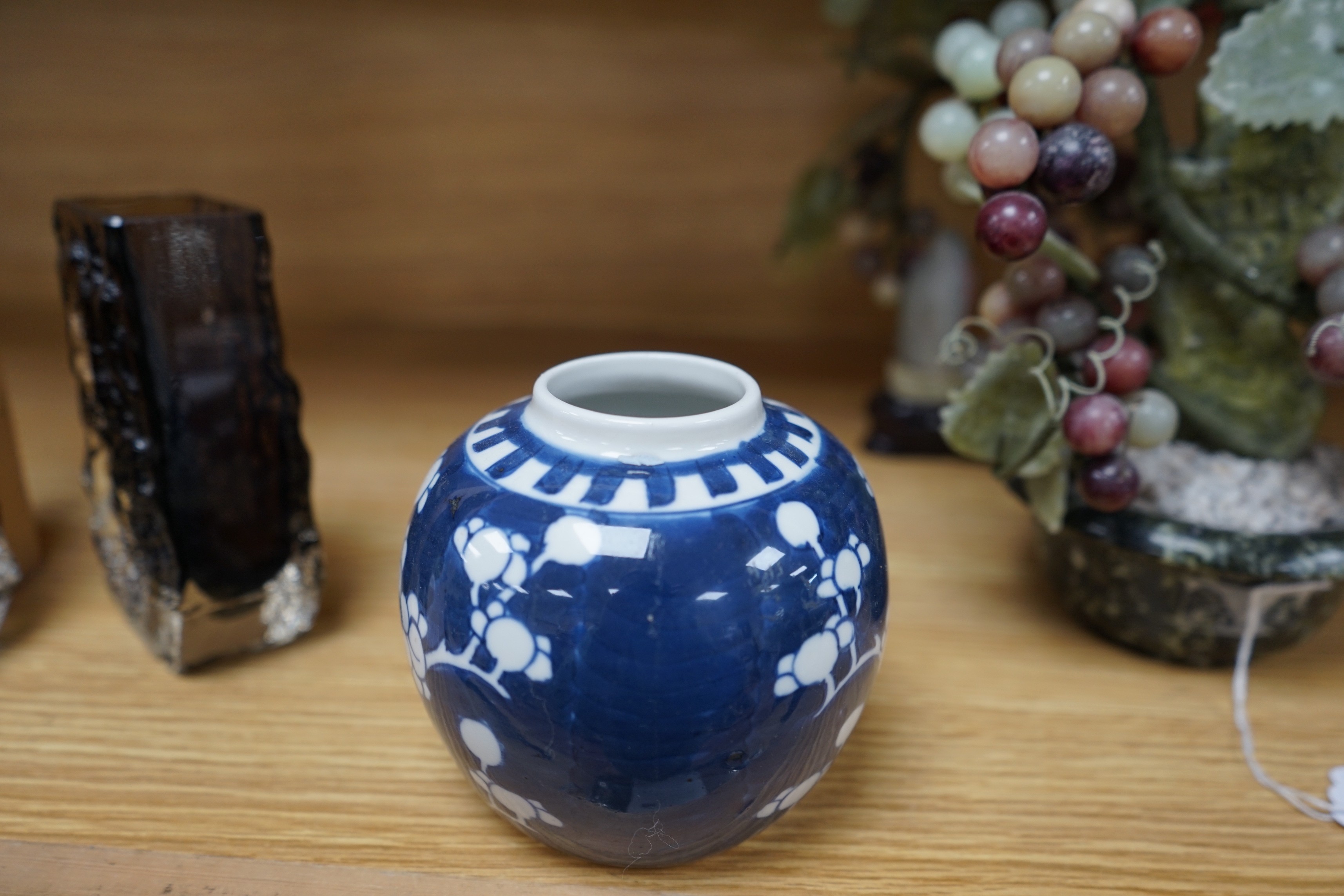 A group of Chinese blue and white prunus vases and jars and covers and jars, pair of vases 23 cms high
